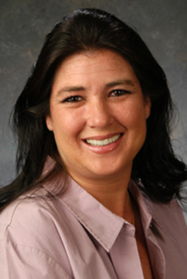 Woman in light purple collared shirt