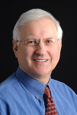 Male patient with glasses and tie