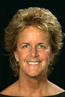 Smiling dental patient with earrings