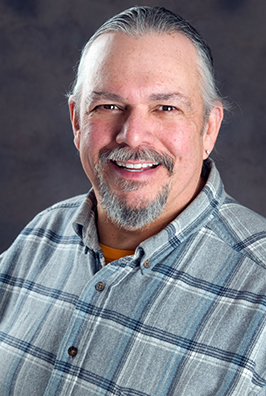 Bearded man in a button-up shirt