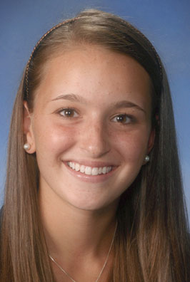 Young female dental patient smiling