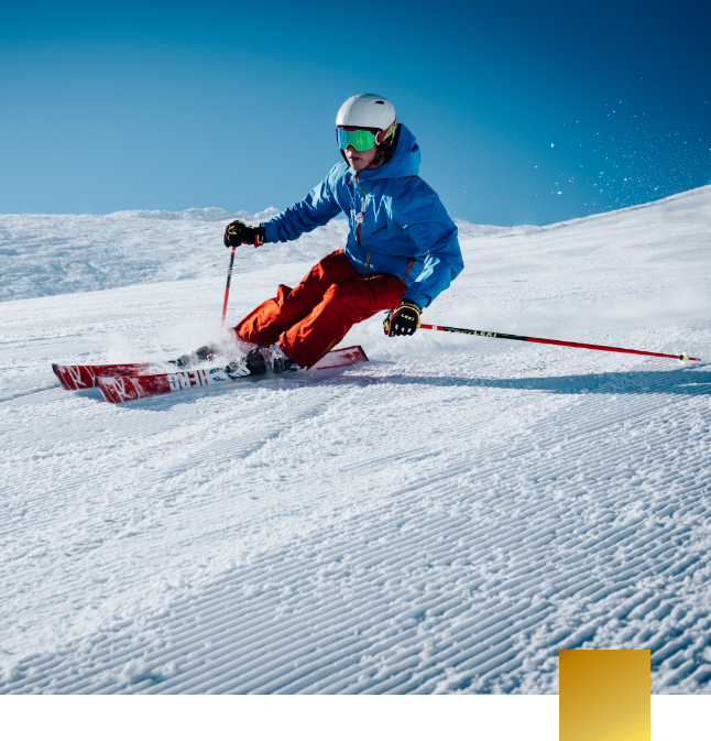 Person snowskiing down a hill