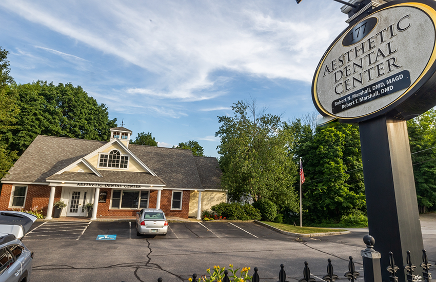 Outside shot of sign and dental practice