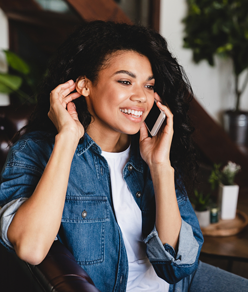 Smiling woman talking on phone