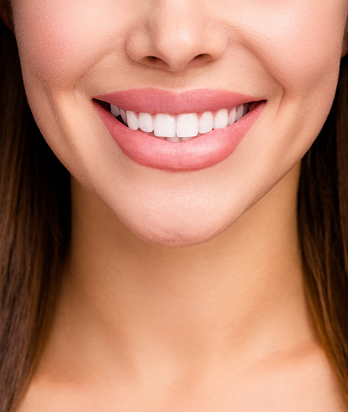 Close up of woman smiling after visiting dentist in Concord